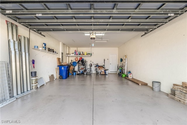 garage featuring a garage door opener