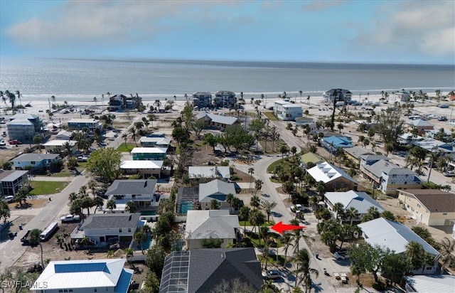 bird's eye view featuring a water view and a residential view