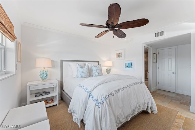 bedroom featuring ceiling fan and crown molding