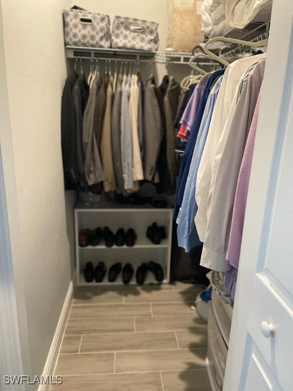 spacious closet with light wood-type flooring