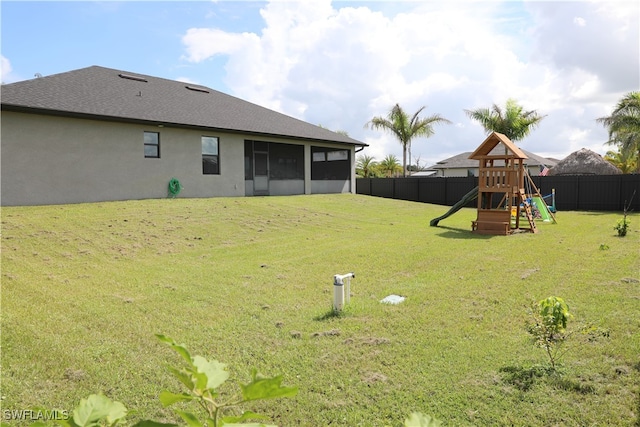 view of yard featuring a playground