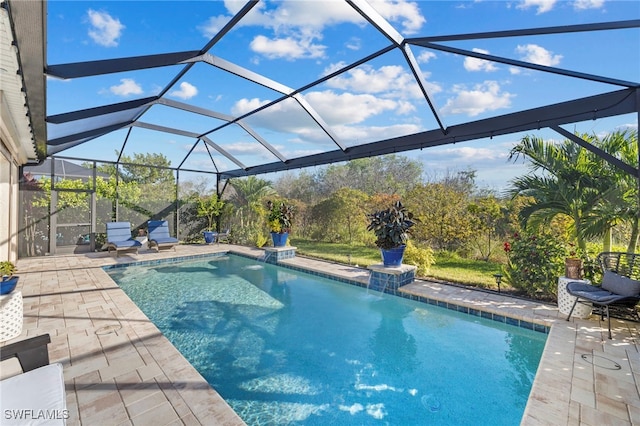 view of pool featuring a patio, a lanai, and pool water feature