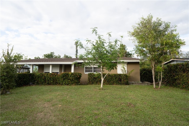 view of front of property with a front yard