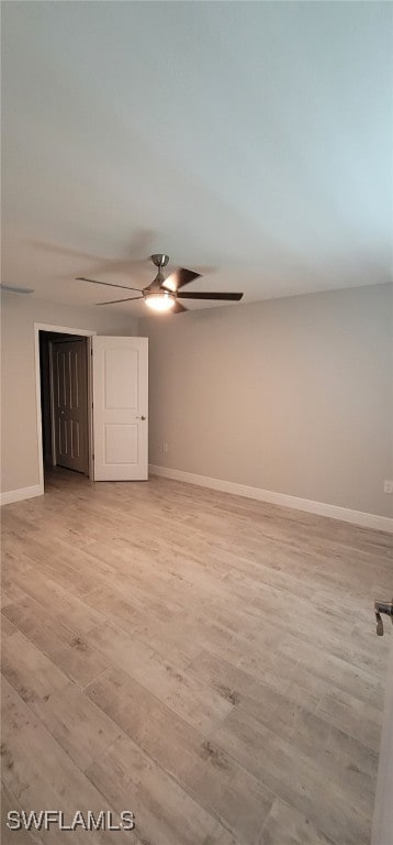 spare room with light wood-type flooring