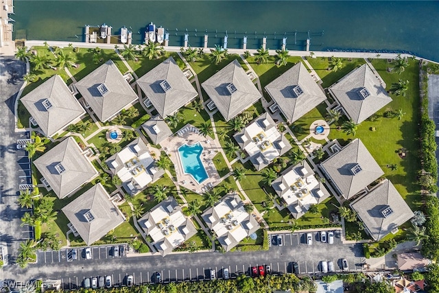 bird's eye view with a water view