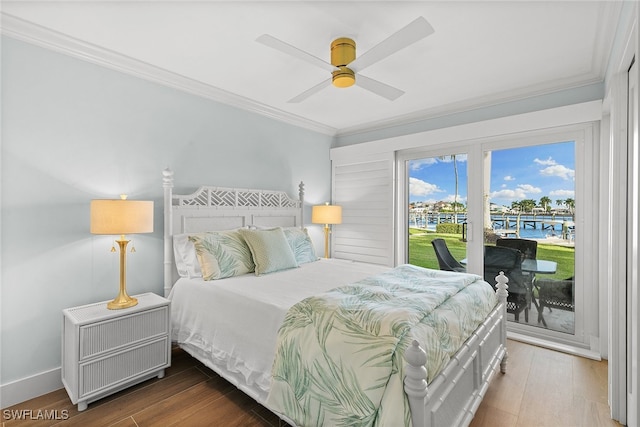 bedroom featuring hardwood / wood-style floors, ceiling fan, access to exterior, and ornamental molding