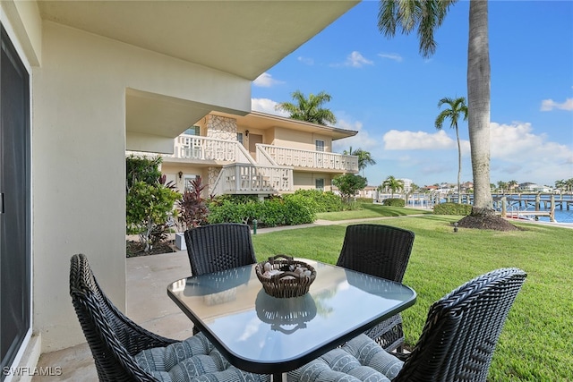 view of patio featuring a water view