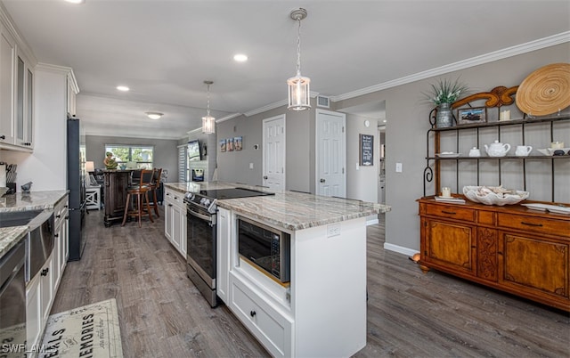 kitchen featuring white cabinets, black appliances, dark hardwood / wood-style floors, light stone countertops, and a kitchen island