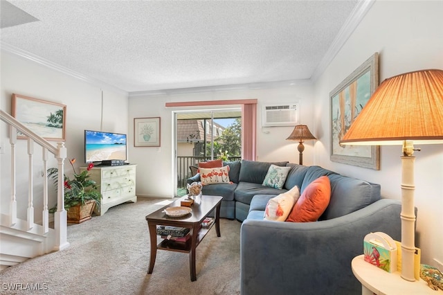 carpeted living room with a wall mounted AC, a textured ceiling, and ornamental molding