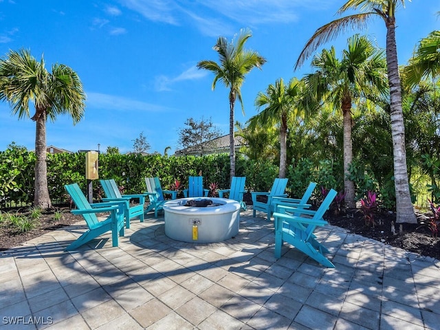 view of patio / terrace with a fire pit