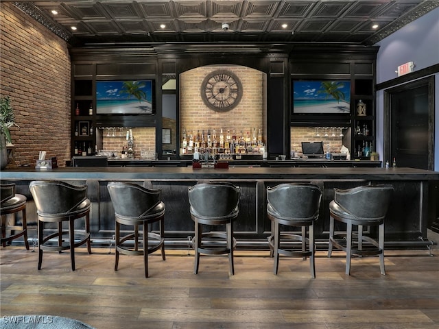 19431 Elston Way, Estero, FL 33928 - community bar area featuring an ornate ceiling, brick wall, and wood-type flooring