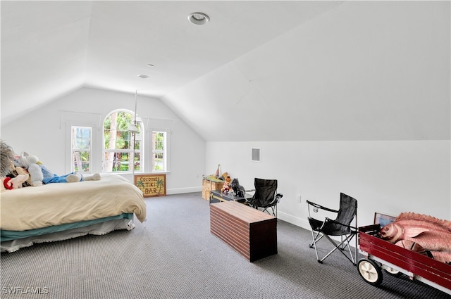 carpeted bedroom featuring vaulted ceiling