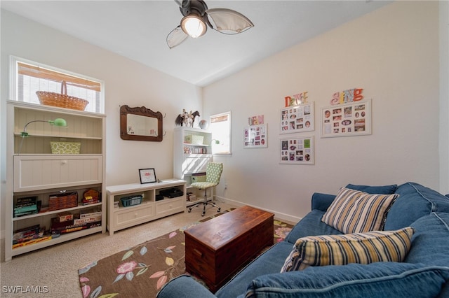 sitting room with carpet floors and ceiling fan