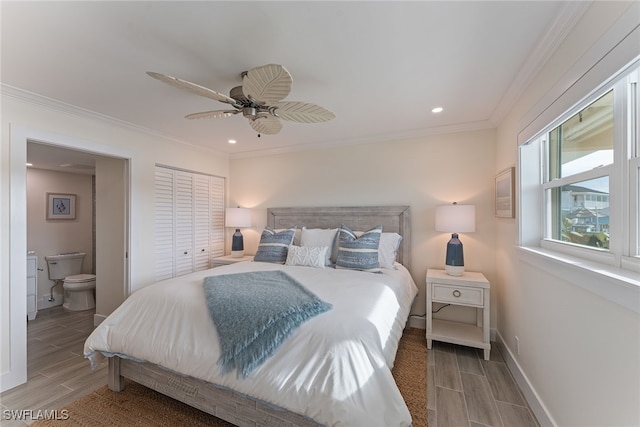 bedroom with connected bathroom, ceiling fan, a closet, and ornamental molding