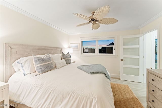 bedroom featuring light wood-type flooring, ceiling fan, and ornamental molding