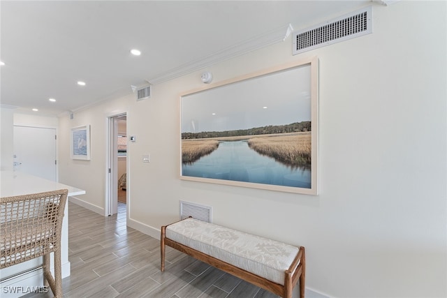 corridor with crown molding