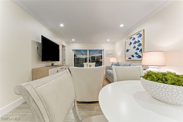 living room featuring crown molding