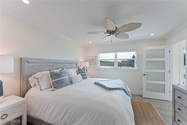 bedroom featuring ceiling fan and crown molding