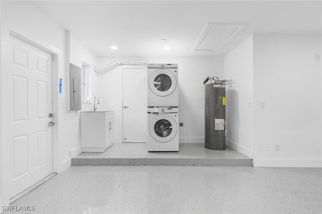 laundry room with sink, electric water heater, stacked washer and dryer, and electric panel