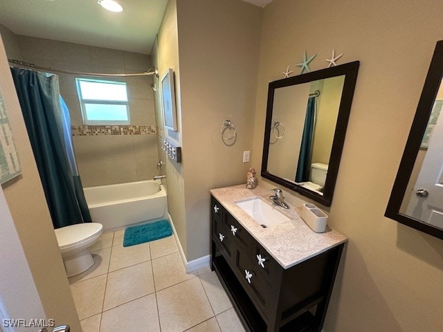 full bathroom featuring tile patterned flooring, vanity, shower / tub combo, and toilet