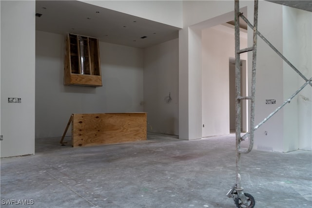 interior space with concrete flooring