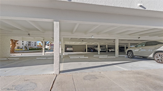 garage with a carport