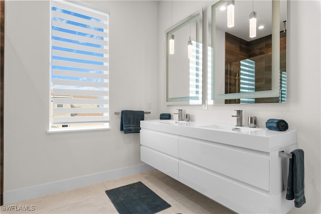 bathroom with tile patterned flooring and vanity