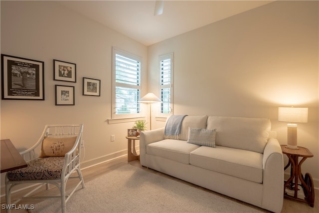 living room with light hardwood / wood-style flooring