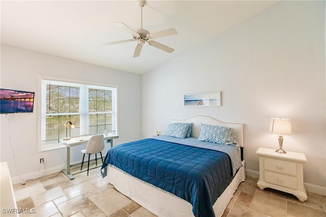 bedroom featuring ceiling fan and vaulted ceiling