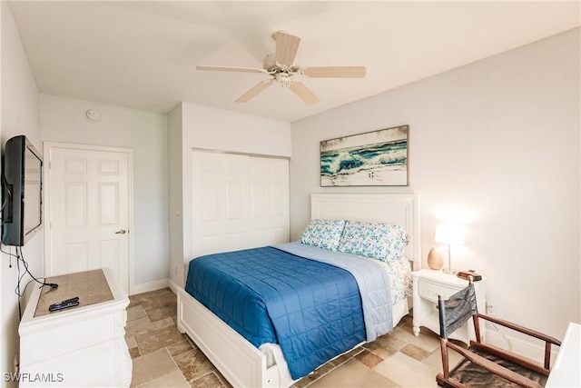 bedroom featuring a closet and ceiling fan