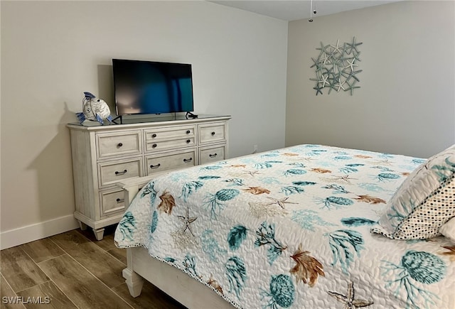 bedroom with light wood-type flooring