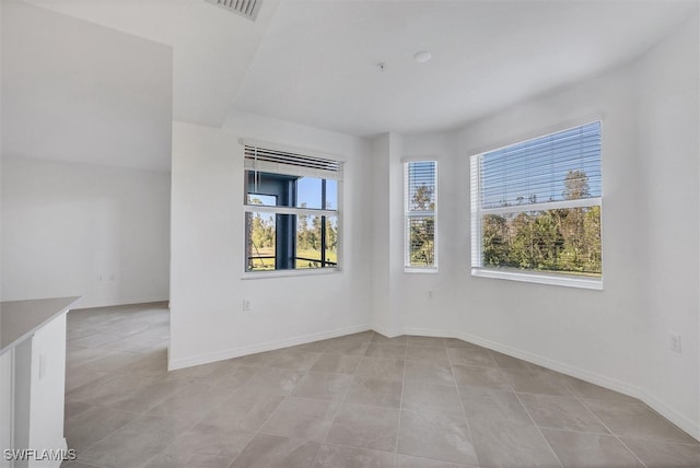 view of tiled empty room