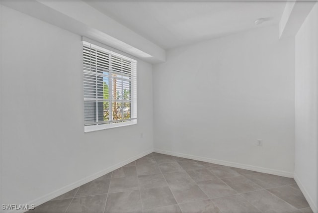 view of tiled spare room