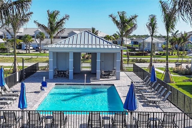 view of pool featuring a gazebo and a patio