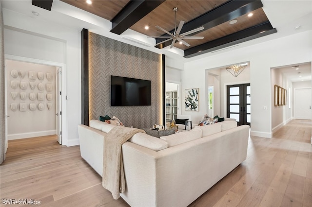 living room featuring beam ceiling, french doors, wooden ceiling, and light wood-type flooring