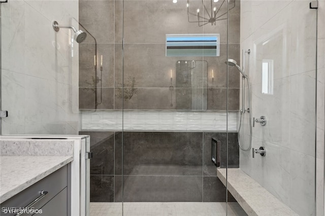 bathroom featuring vanity and walk in shower