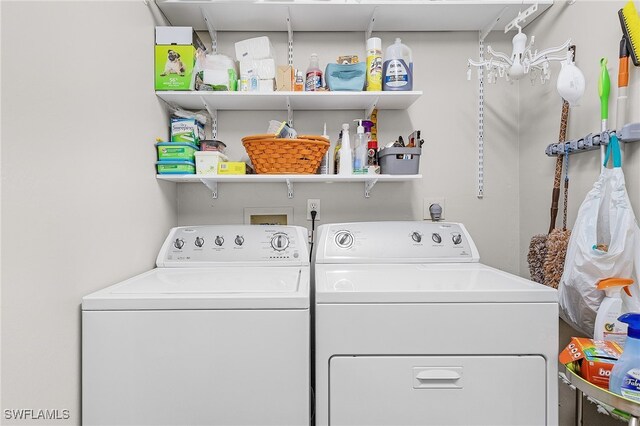 laundry area featuring independent washer and dryer