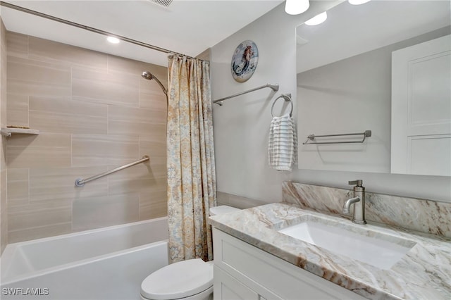 1051 3rd St S Unit 201, Naples, FL 34102 - bathroom featuring vanity, toilet, and shower / bath combination with curtain