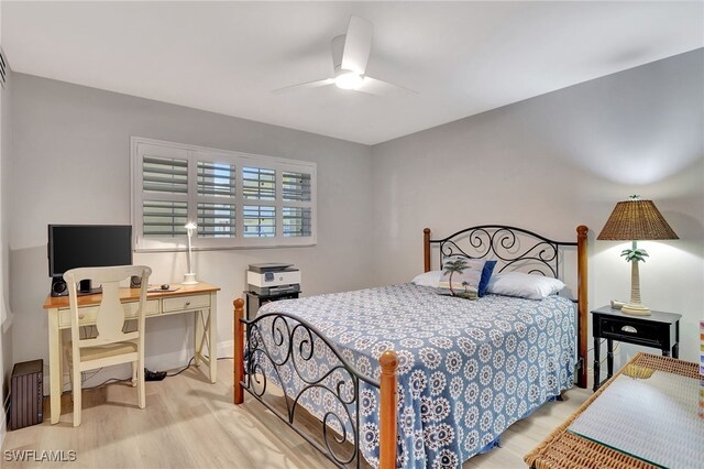 bedroom with ceiling fan and light wood-type flooring