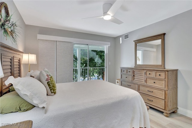 bedroom featuring access to outside, ceiling fan, and light wood-type flooring