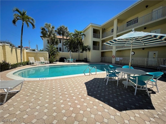 1051 3rd St S Unit 201, Naples, FL 34102 - community pool featuring a patio area