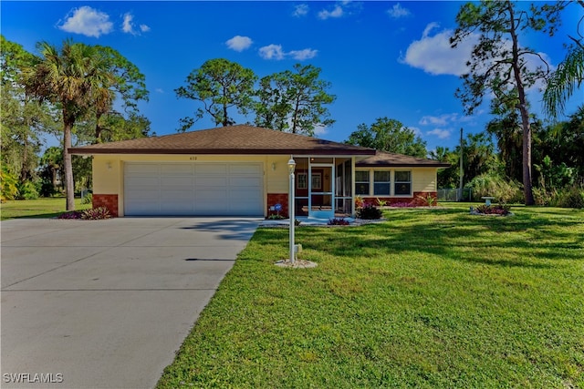 ranch-style home with a front yard and a garage