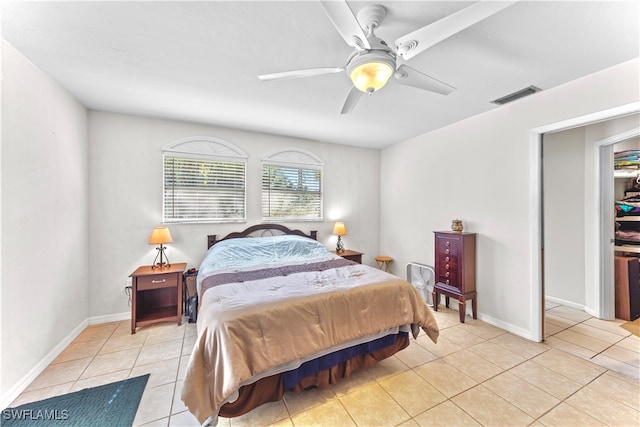 bedroom featuring ceiling fan and light tile patterned floors