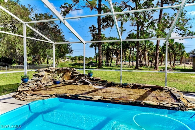 view of pool featuring a lanai