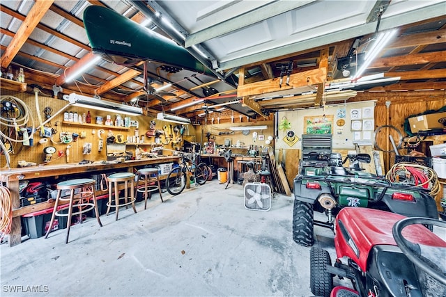 garage featuring a workshop area