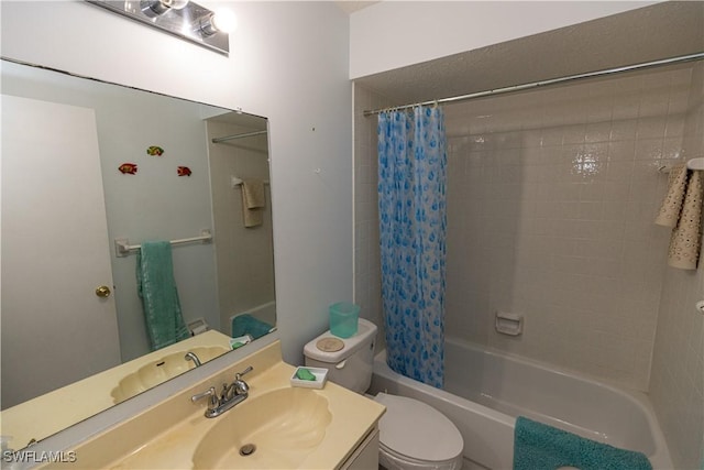 full bathroom with shower / bath combo, vanity, and toilet