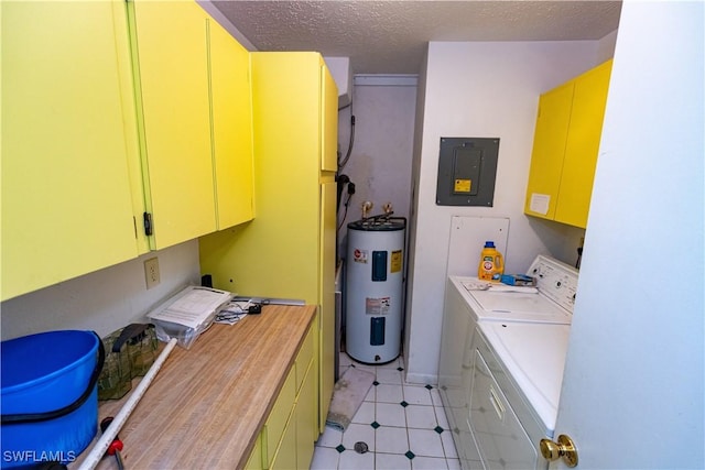 washroom featuring cabinet space, electric water heater, a textured ceiling, electric panel, and independent washer and dryer