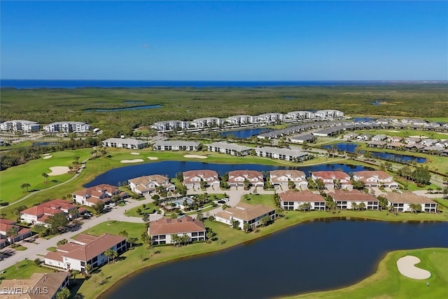 bird's eye view with a water view