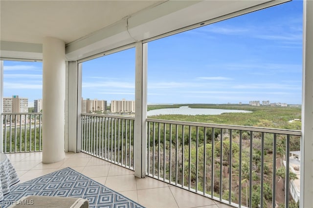 sunroom with a water view