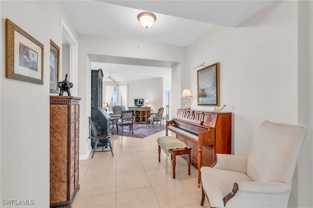 hall with light tile patterned floors